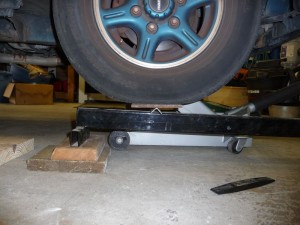 Wheel sitting on lever, for weighing